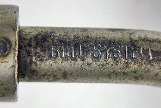 "BELL SYSTEM" stamped into bow